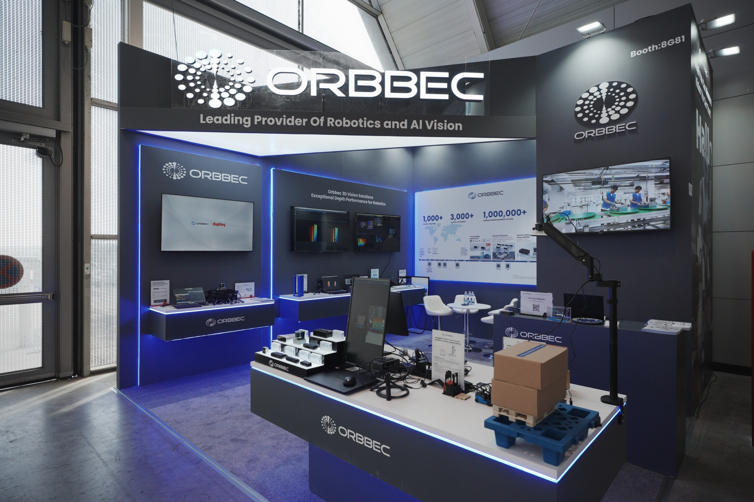 Full view of Orbbec booth 8G81 at LogiMAT 2026 in Messe Stuttgart featuring live demos, product displays, and signage reading Leading Provider of Robotics and AI Vision